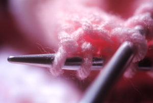 There was always a knitting project on the go for English girls of my era. (Don't worry, Rowan, it's not pink!)